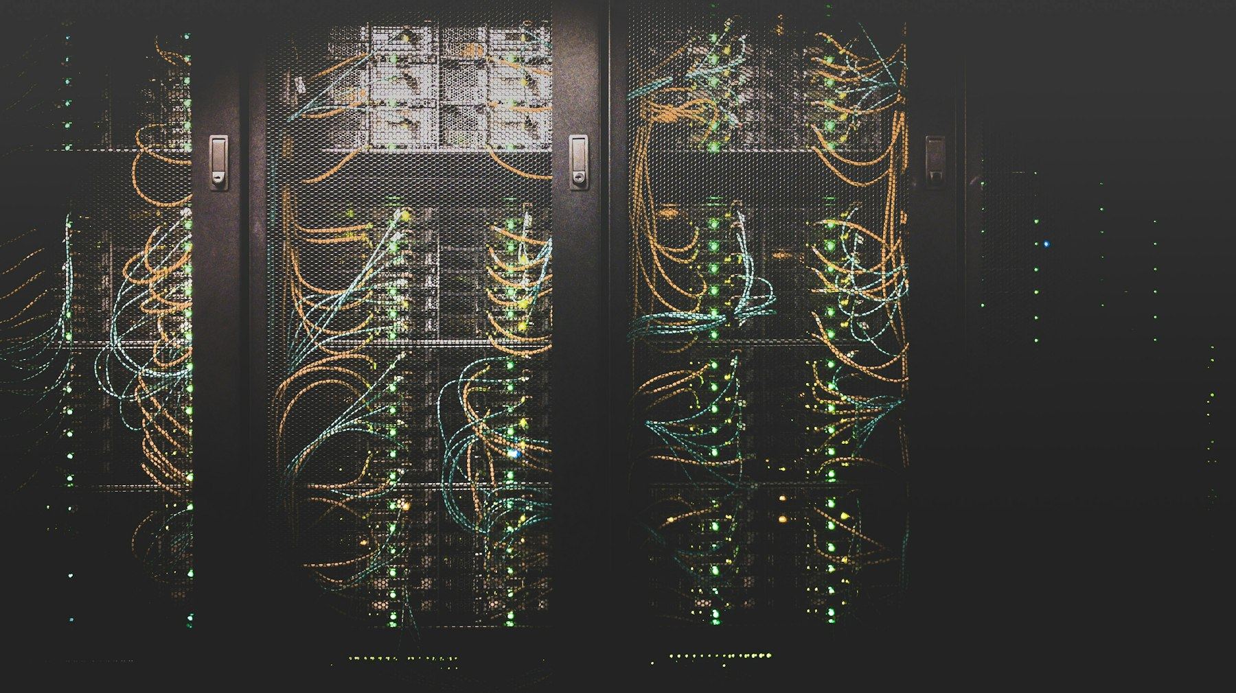 Data center aisle in low light
